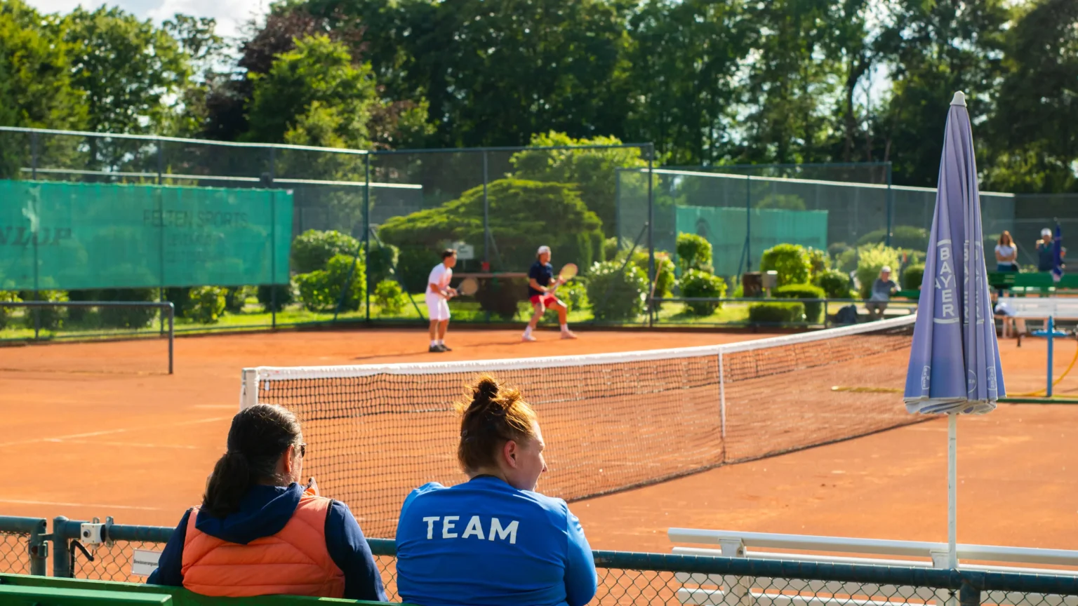 college tennis coaches watching players