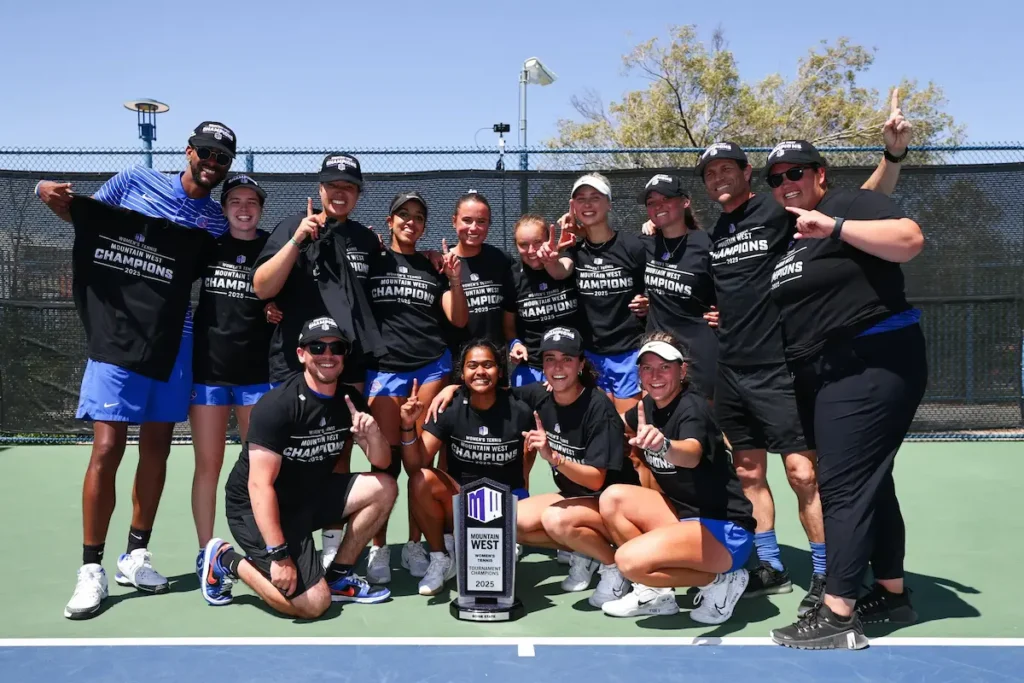 Paula Schaefer and her team, Boise State, celebrating the 2025 conference championship.
