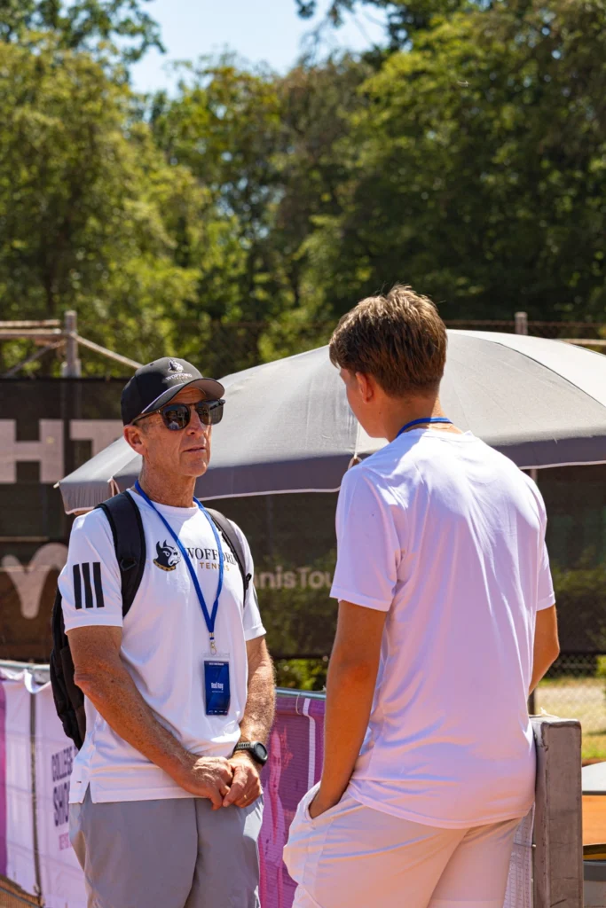 college coach and player at tennis showcase